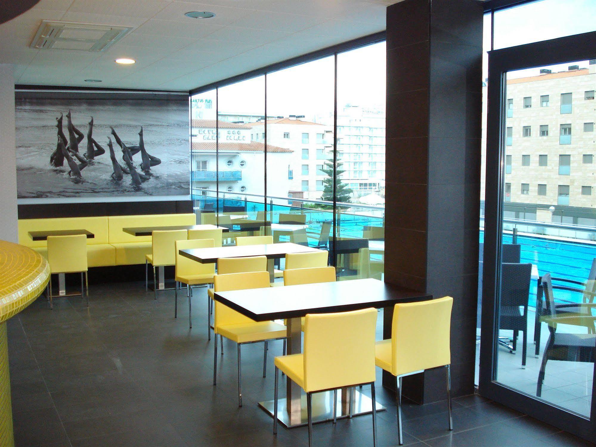 Sant Jordi Boutique Hotel Calella Exterior photo Interior of a McDonald's restaurant in Prague, Czech Republic
