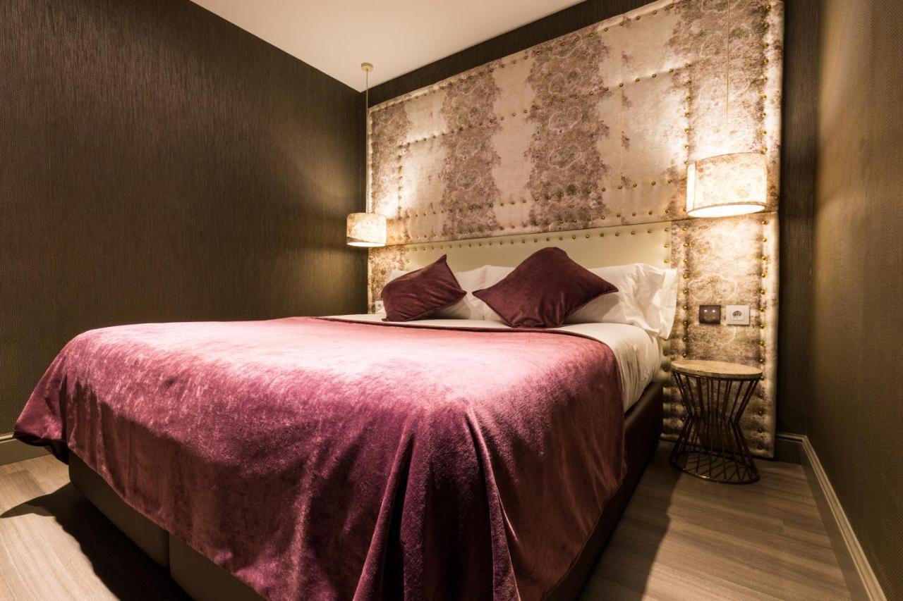 Sant Jordi Boutique Hotel Calella Exterior photo A bedroom at the hotel